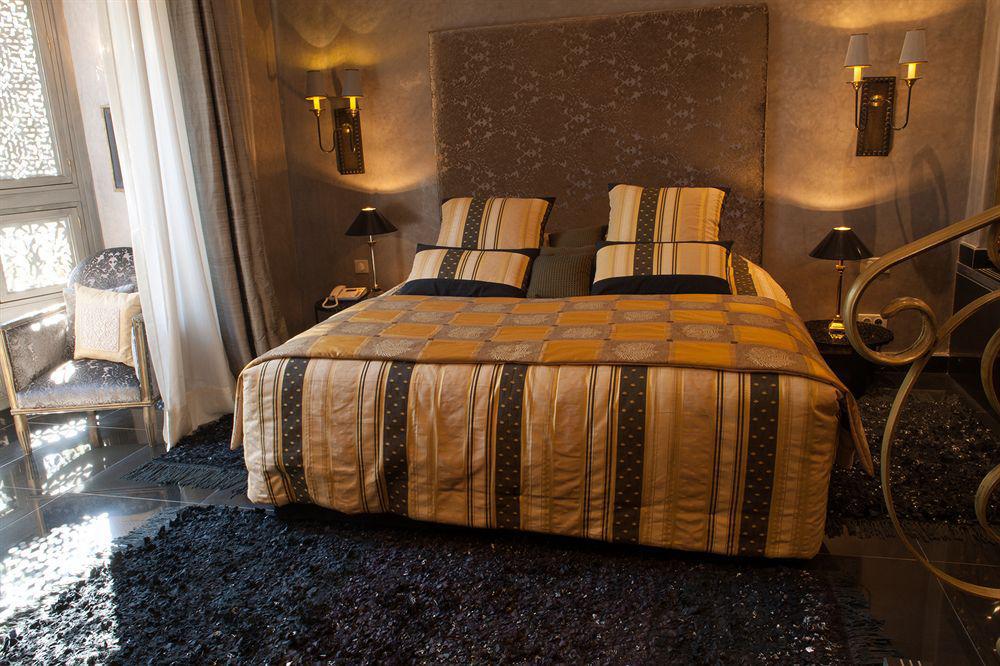 티그미자 스위트 앤 파빌리온 호텔 Ouled Jelal 외부 사진 A bedroom at the hotel