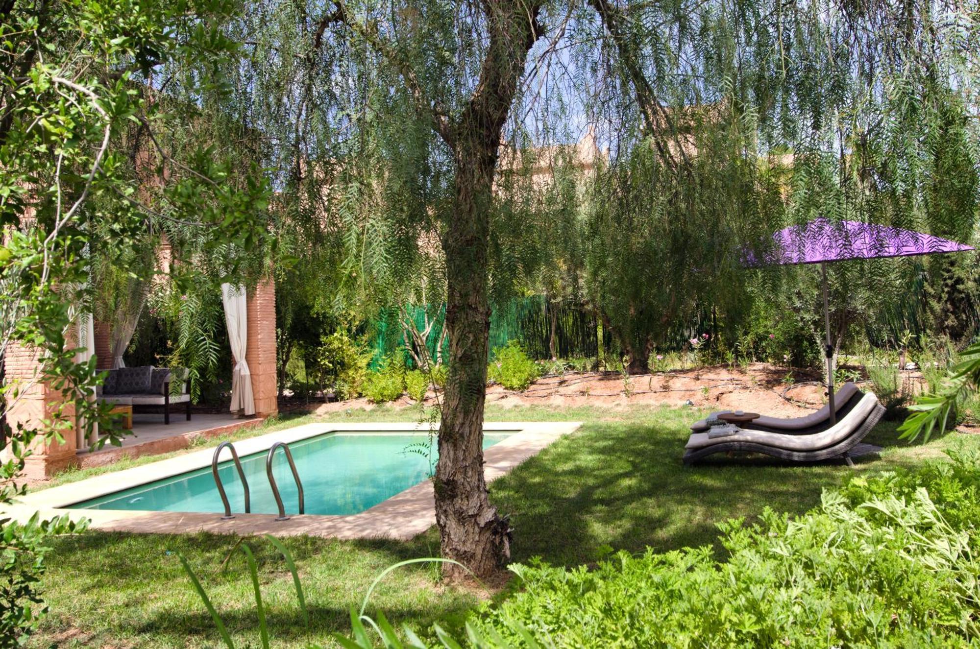 티그미자 스위트 앤 파빌리온 호텔 Ouled Jelal 객실 사진 The garden of the Riad
