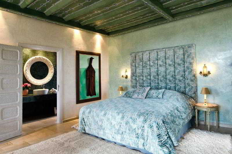 티그미자 스위트 앤 파빌리온 호텔 Ouled Jelal 외부 사진 A bedroom at the hotel